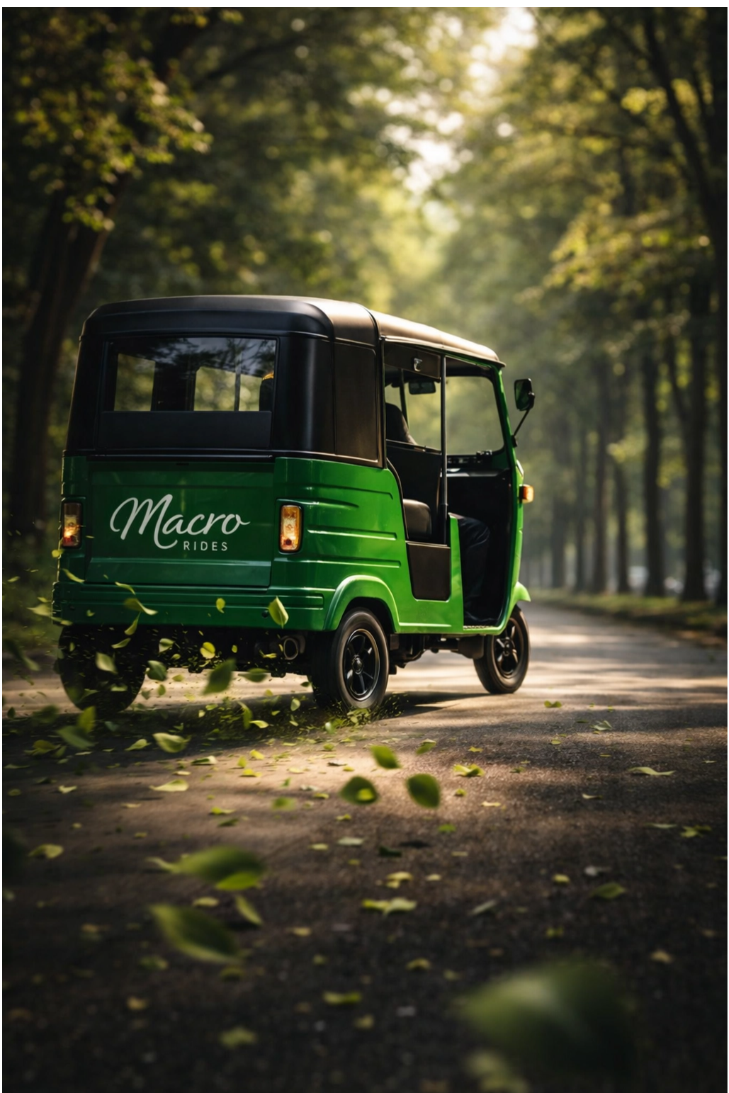 A MacroRides electric rickshaw on a tree-lined street